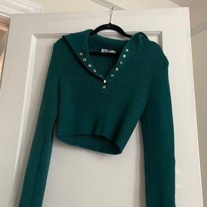 Polo collar ribbed sweater with gold snap detail